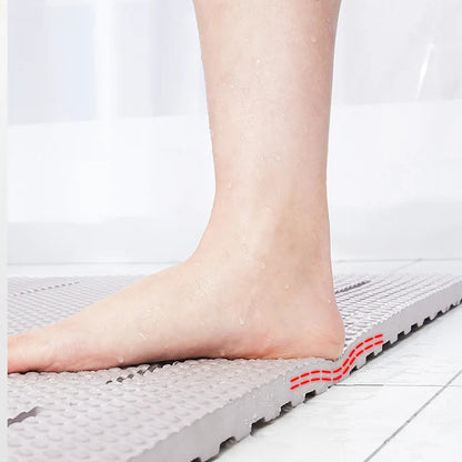 White shower mat with drainage slots