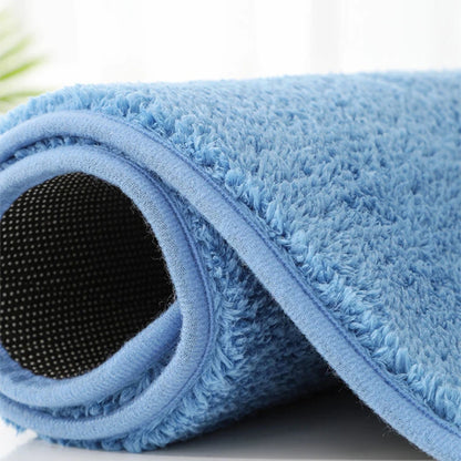 Blue bath mat with soft plush