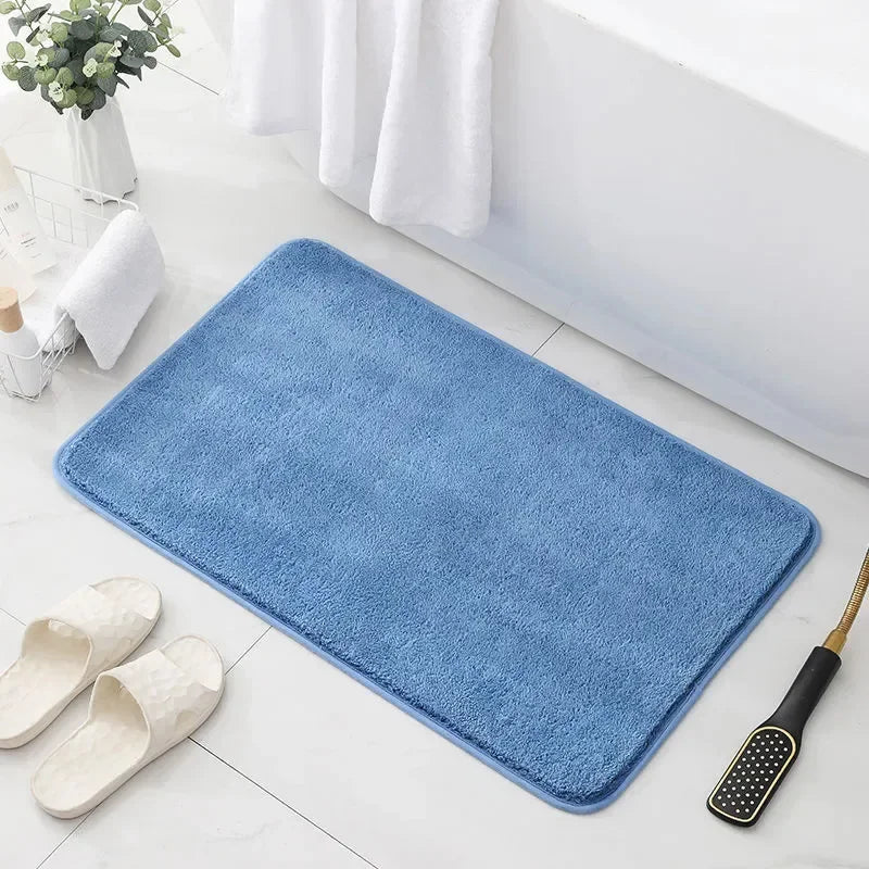 Blue bath mat with soft plush