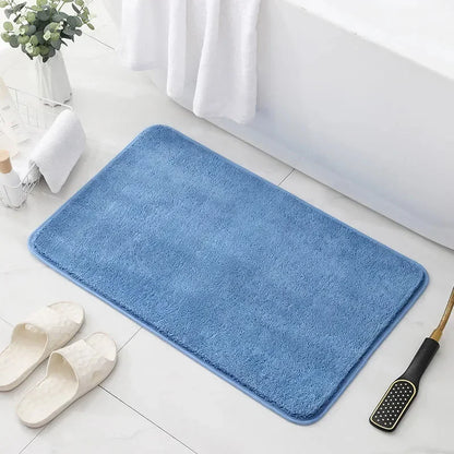Blue bath mat with soft plush
