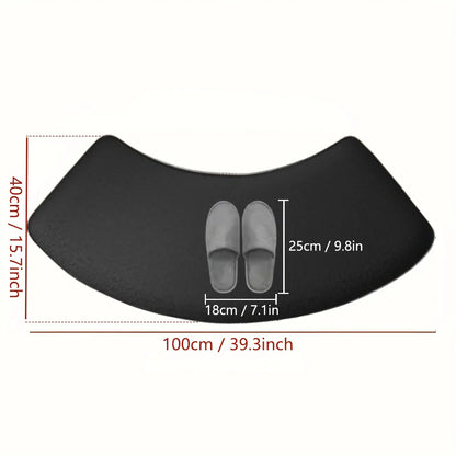 Black curved bath mat