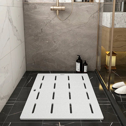 White shower mat with drainage slots