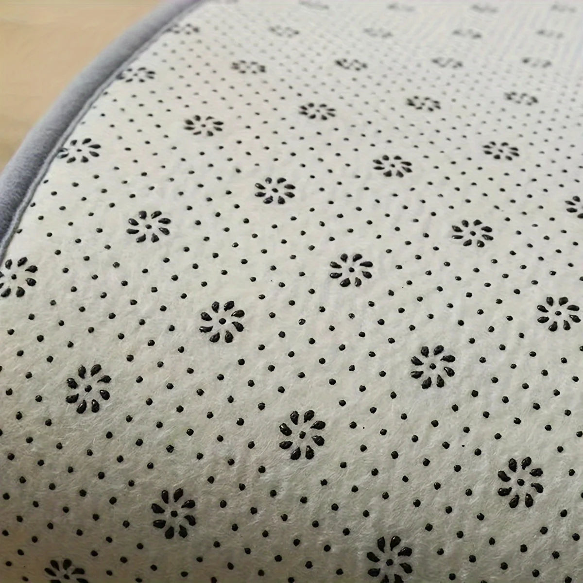 Grey L shaped bath mat